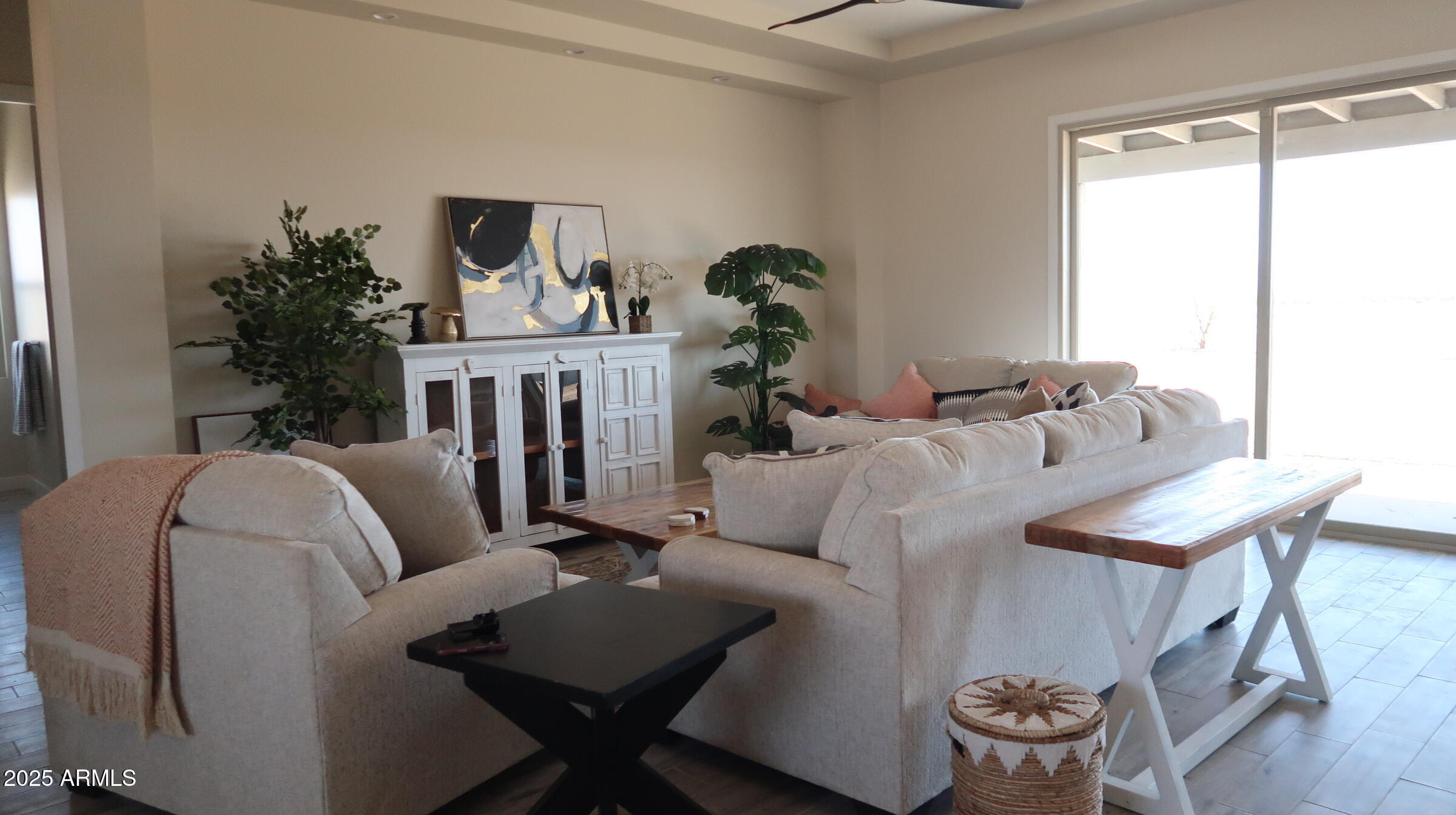 23131 West Skinner Road Wittmann, AZ 85361 - Photo 10 of 13 a living room with furniture and wooden floor