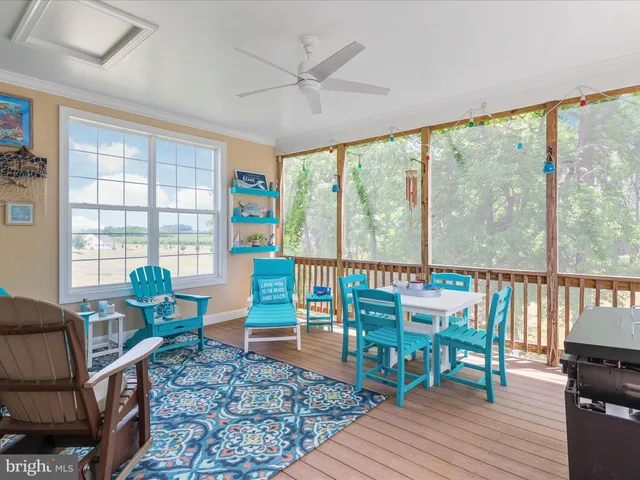 a living room filled with furniture and a table