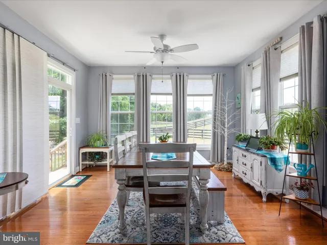 a view of a workspace with furniture and a livingroom
