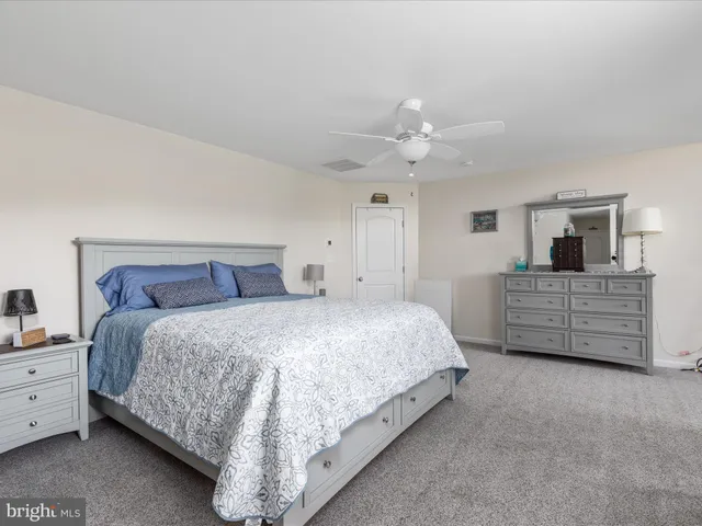 a view of a swimming pool with a yard