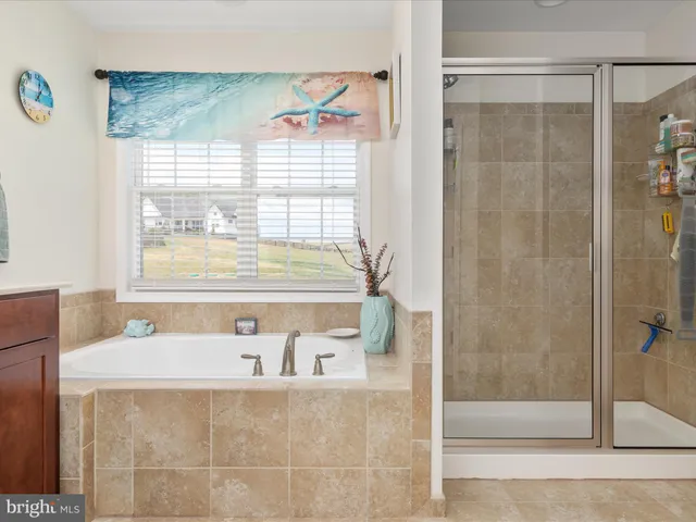 a view of a house with backyard and porch