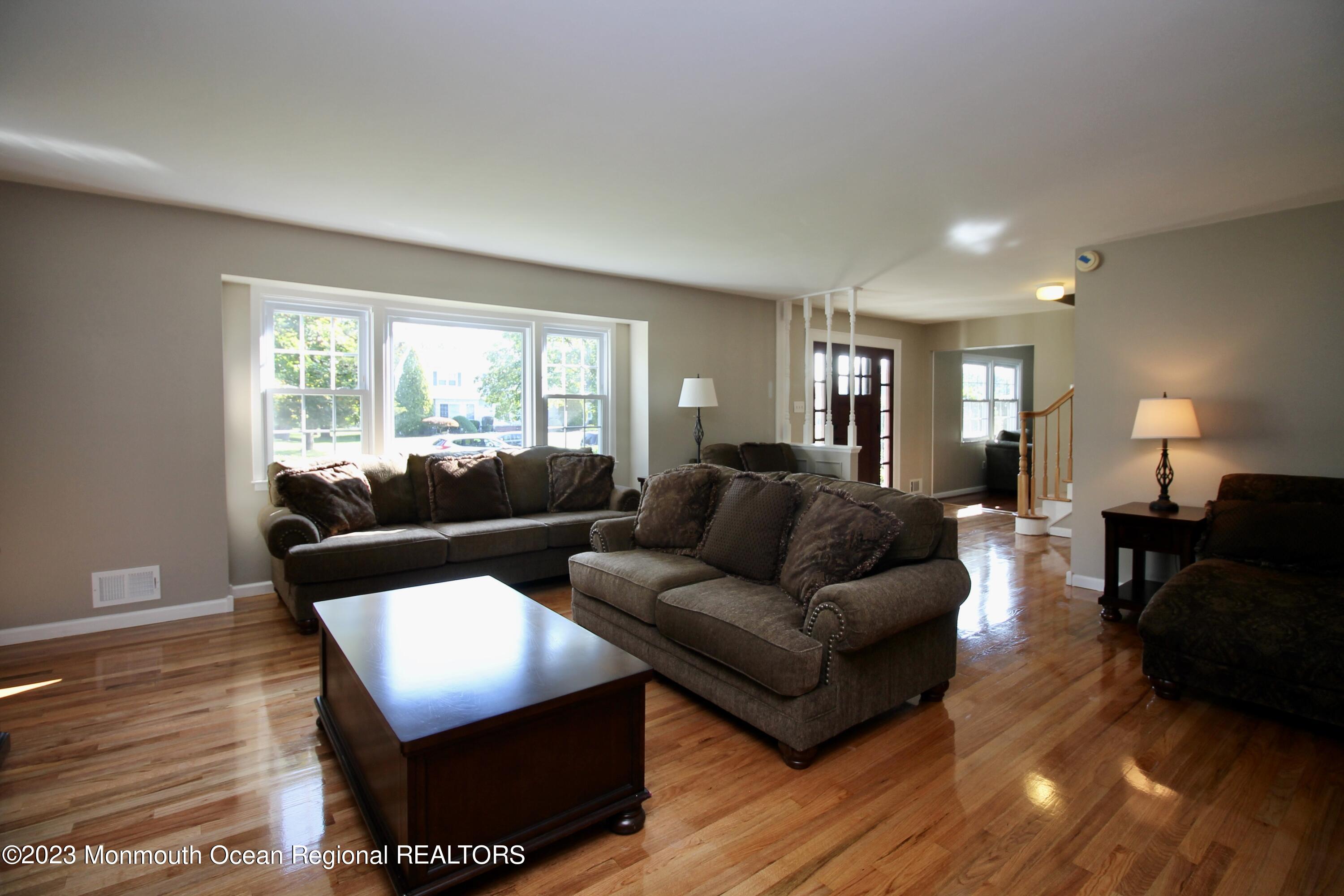 259 Kings Mountain Road Freehold, NJ 07728 - Photo 13 of 61 a living room with furniture and a window