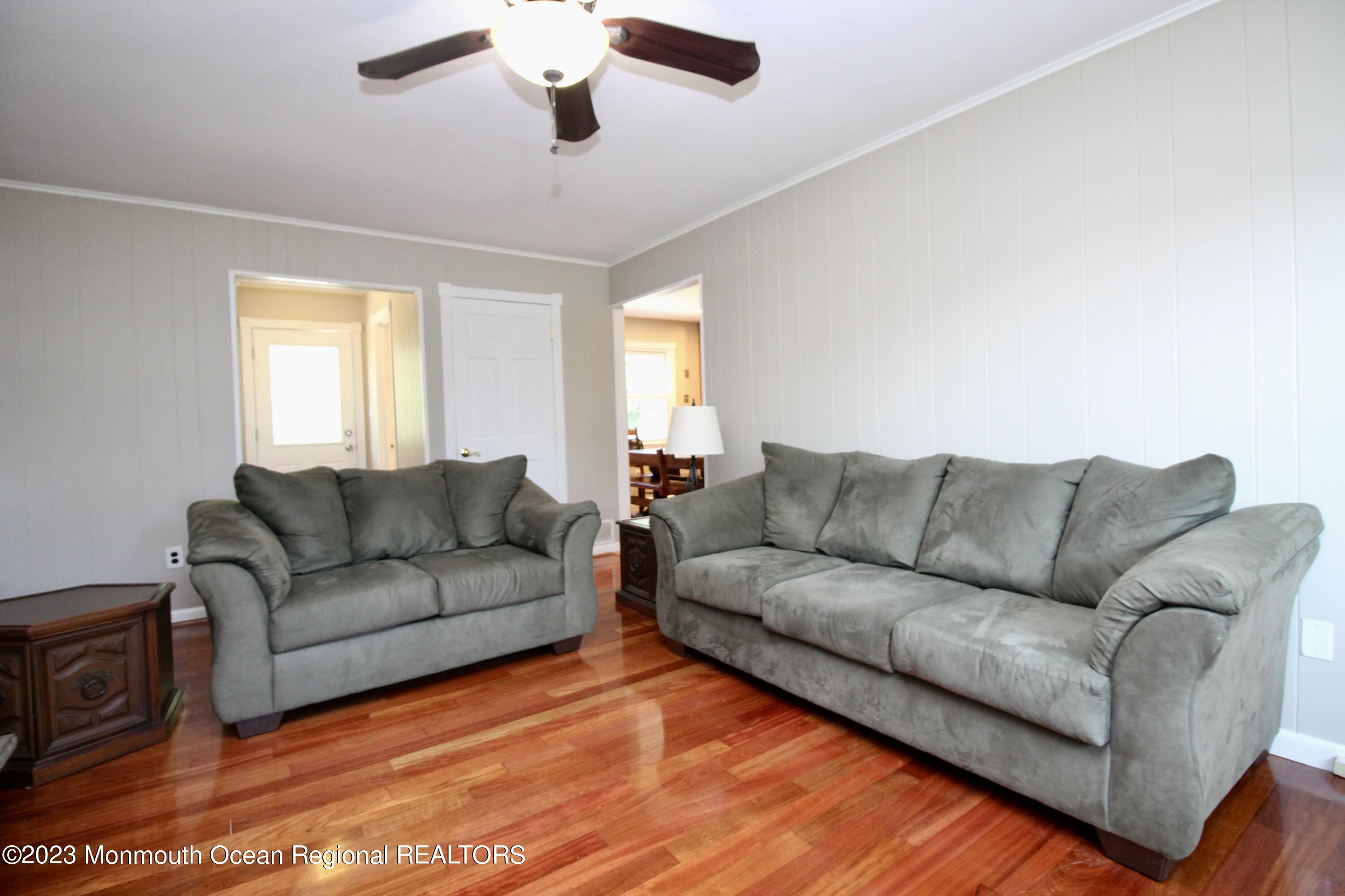 259 Kings Mountain Road Freehold, NJ 07728 - Photo 26 of 61 a living room with furniture and a large window