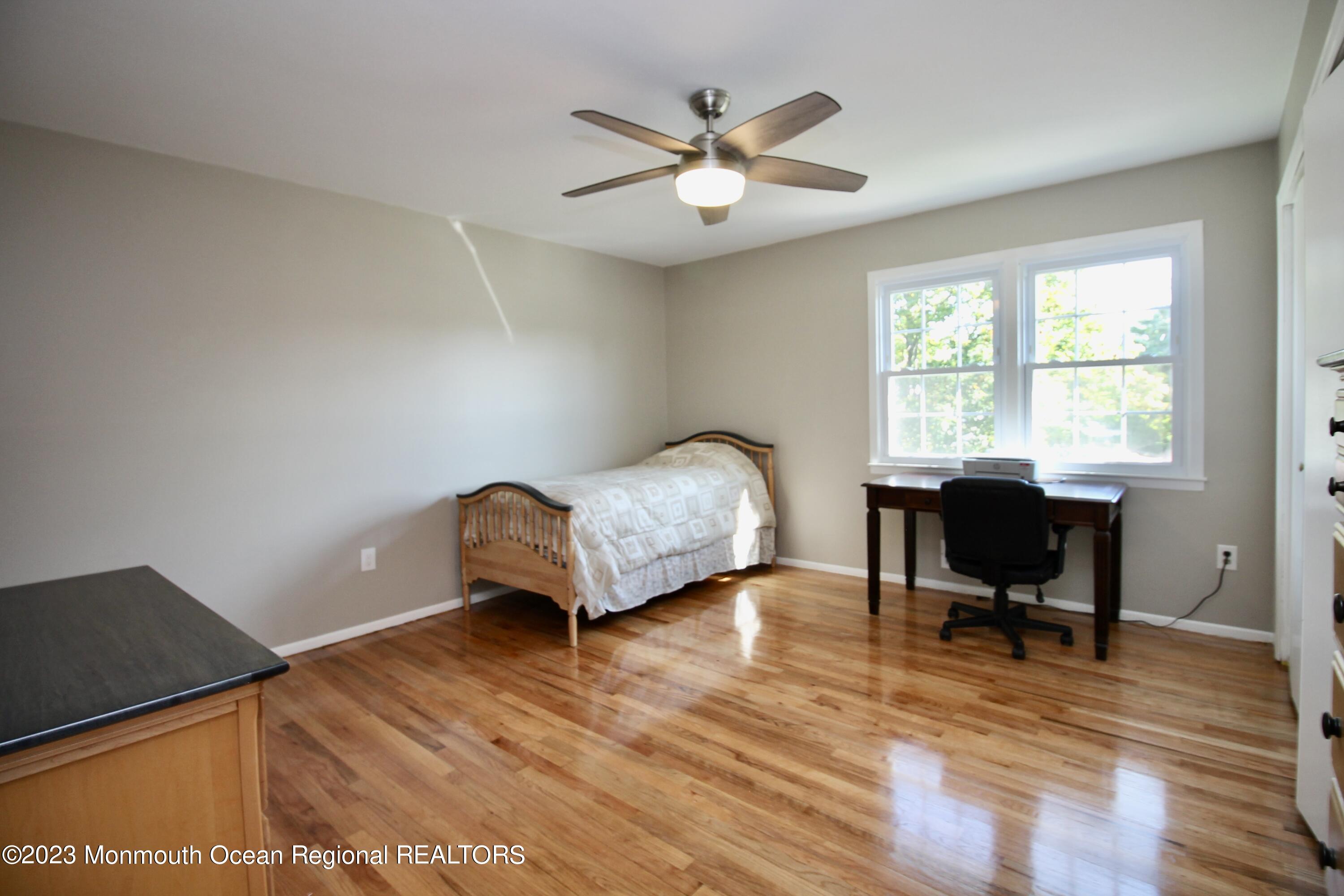 259 Kings Mountain Road Freehold, NJ 07728 - Photo 39 of 61 a bedroom with a bed and a window