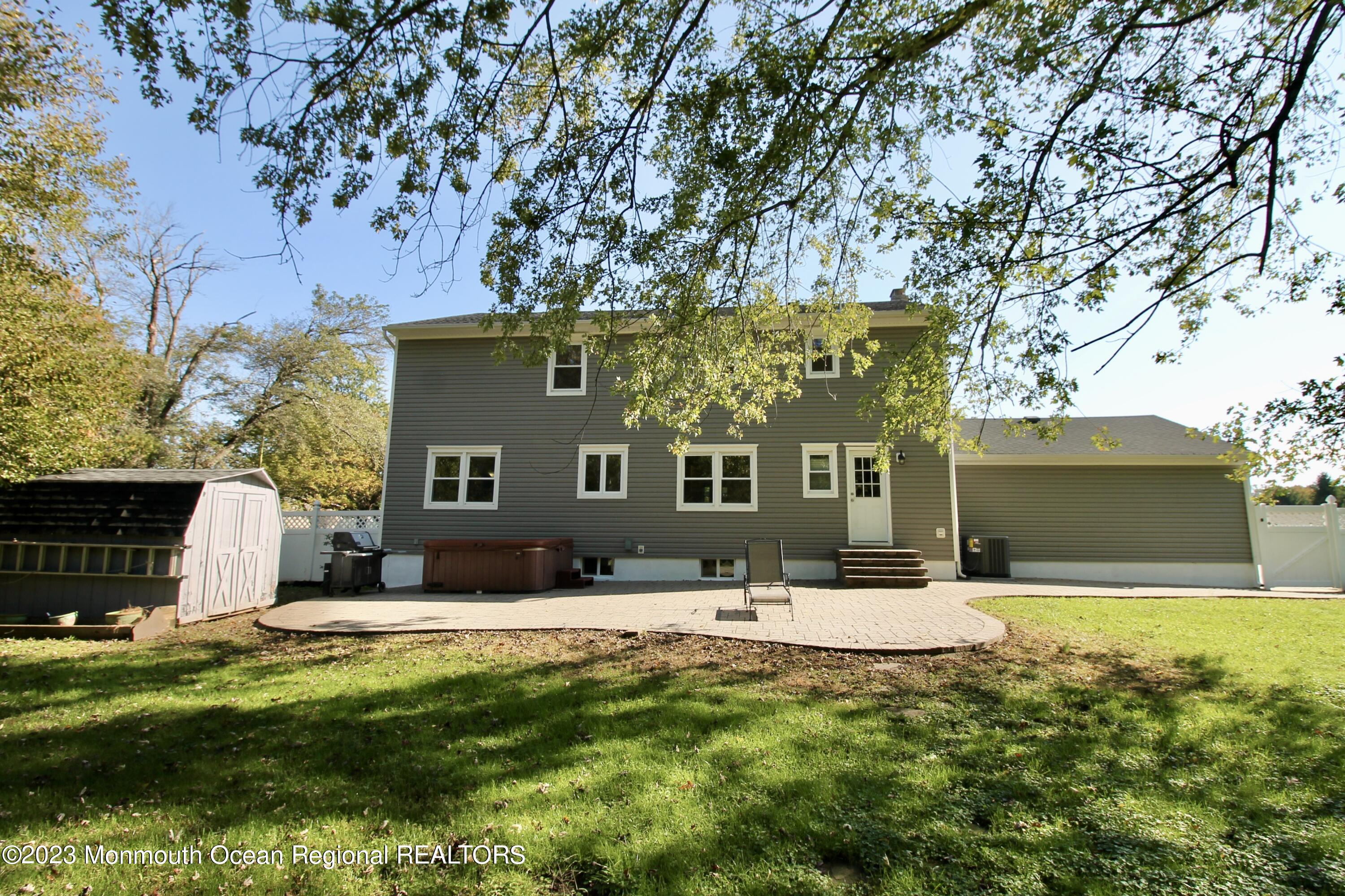 259 Kings Mountain Road Freehold, NJ 07728 - Photo 57 of 61 a view of house with yard
