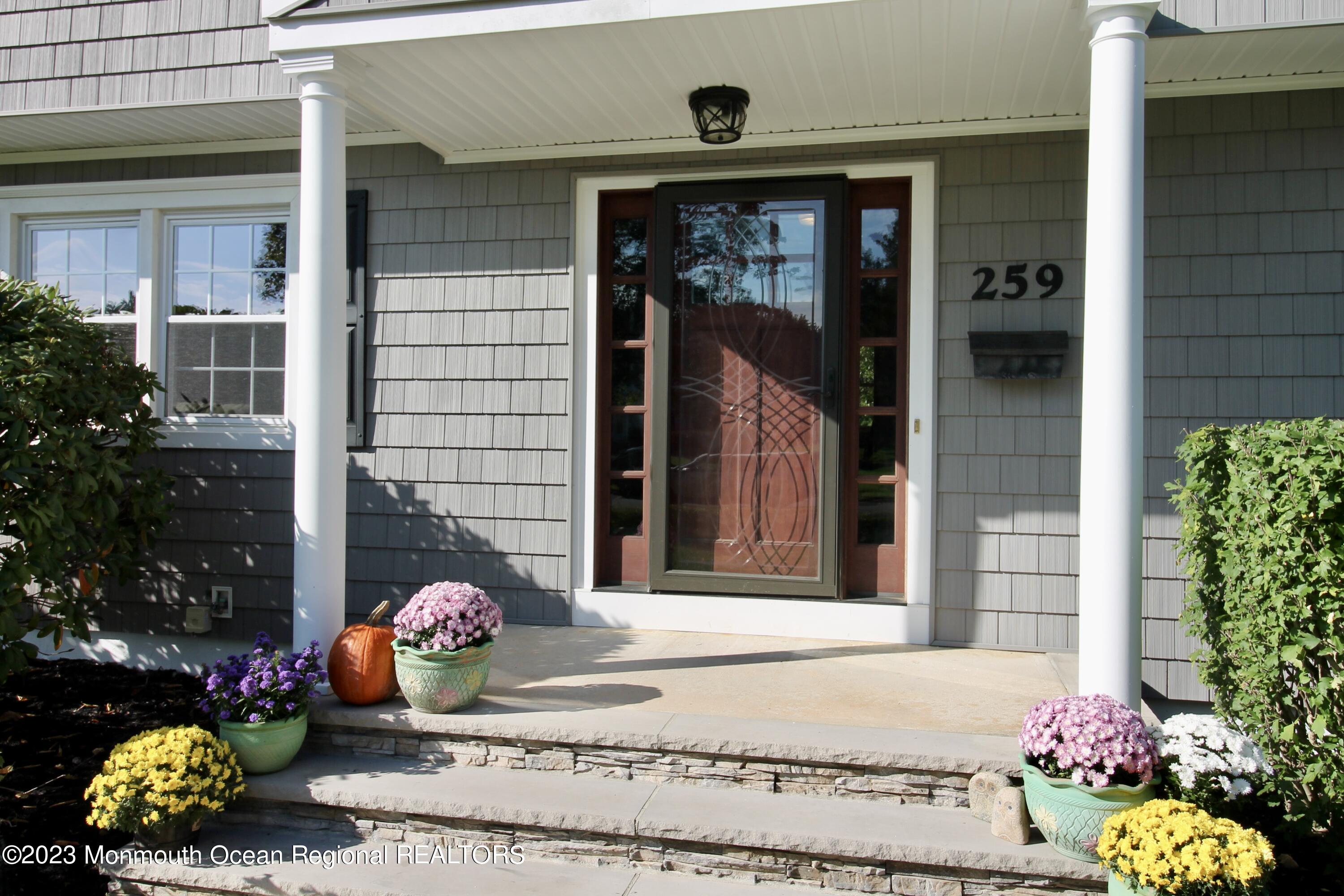 259 Kings Mountain Road Freehold, NJ 07728 - Photo 7 of 61 a front view of a house
