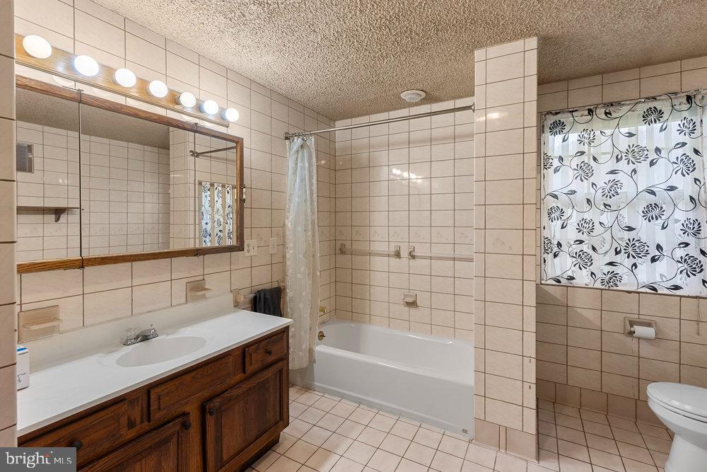367 Bridge Valley Road Pequea, PA 17565 - Photo 20 of 51 a bathroom with a sink a toilet and shower