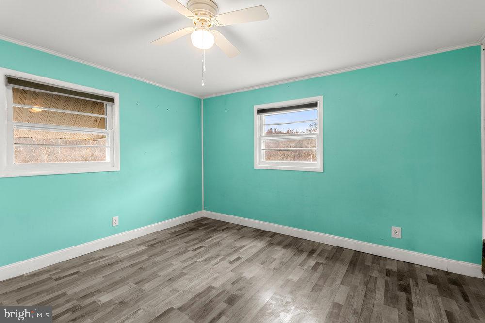 367 Bridge Valley Road Pequea, PA 17565 - Photo 29 of 51 a view of a room with wooden floor and windows