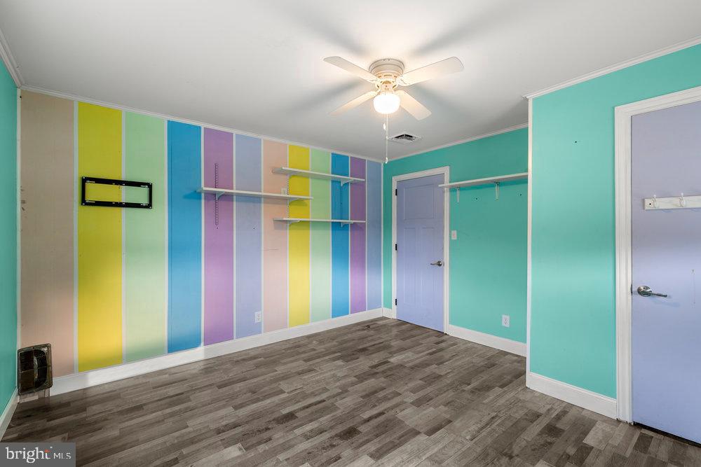 367 Bridge Valley Road Pequea, PA 17565 - Photo 30 of 51 a bedroom with a bed and a chandelier