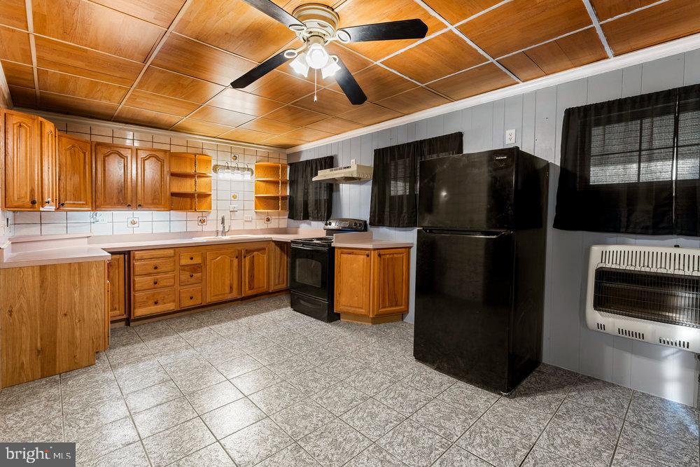367 Bridge Valley Road Pequea, PA 17565 - Photo 39 of 51 a kitchen with stainless steel appliances granite countertop a refrigerator a sink a stove and dishwasher