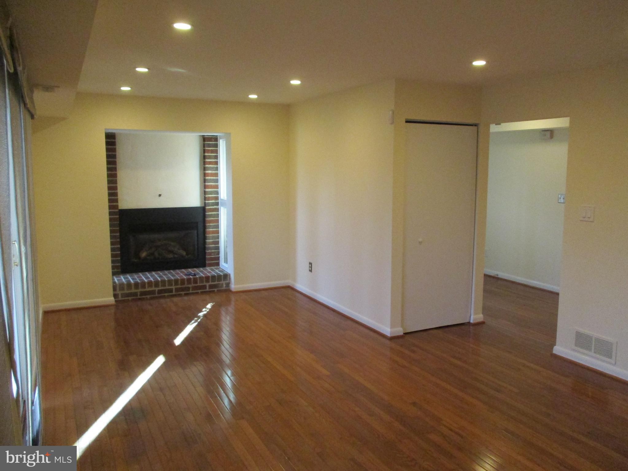 10357 Barcan Circle Columbia, MD 21044 - Photo 5 of 24 a view of hallway with wooden floor