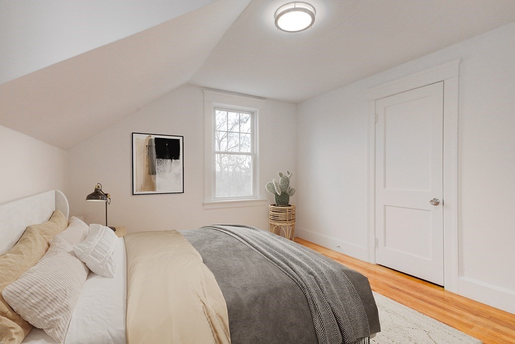 21 Alpine Trail Auburn, MA 01501 - Photo 7 of 10 a bedroom with a bed and a window
