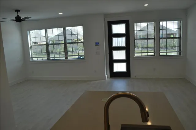 an empty room with windows