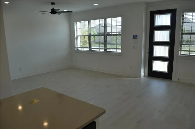 an empty room with windows