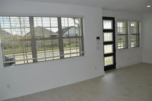 an empty room with windows