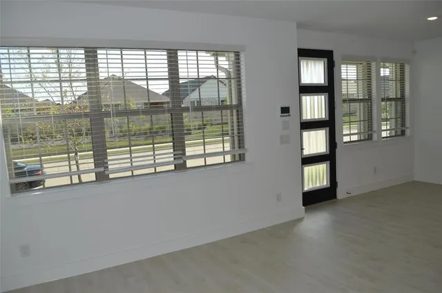 an empty room with windows