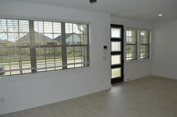 an empty room with windows