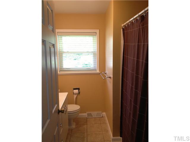 3100 Kenan Road Durham, NC 27704 - Photo 11 of 15 Full bath has new tub surround and light fixture