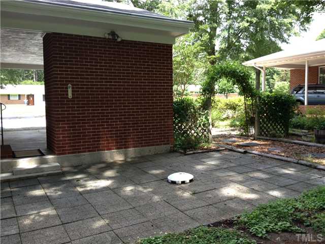 3100 Kenan Road Durham, NC 27704 - Photo 13 of 15 Outdoor patio is a perfect place for grilling and enjoying outside - beautiful trees and lots of garden space