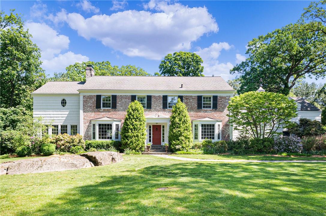 85 Muchmore Road Harrison, NY 10528 - Photo 1 of 1 a front view of a house with a yard