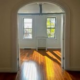 a view of walk in closet with window