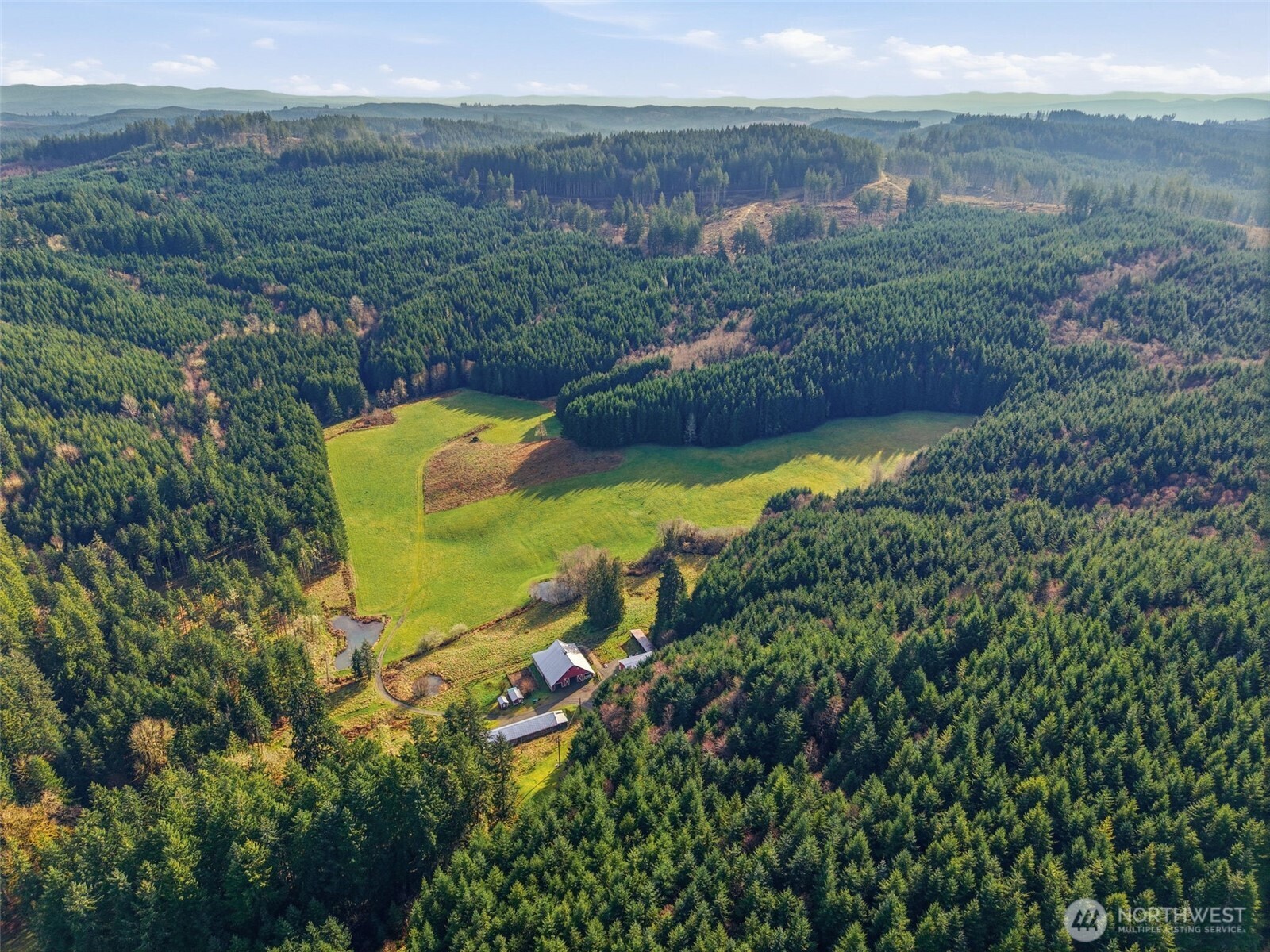 a view of a lake with a yard