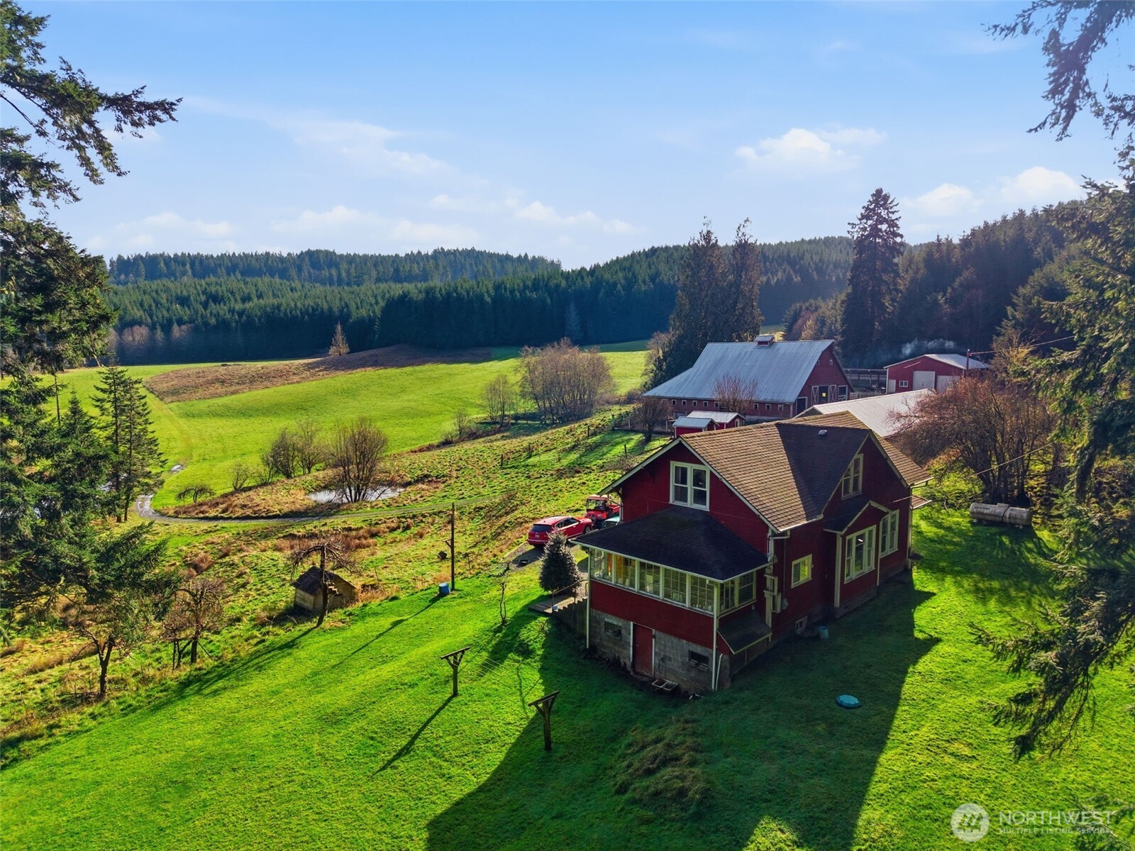 211 Echo Road Rochester, WA 98579 - Photo 28 of 39 a view of a house with a yard and sitting area