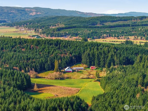a view of a lake with a yard