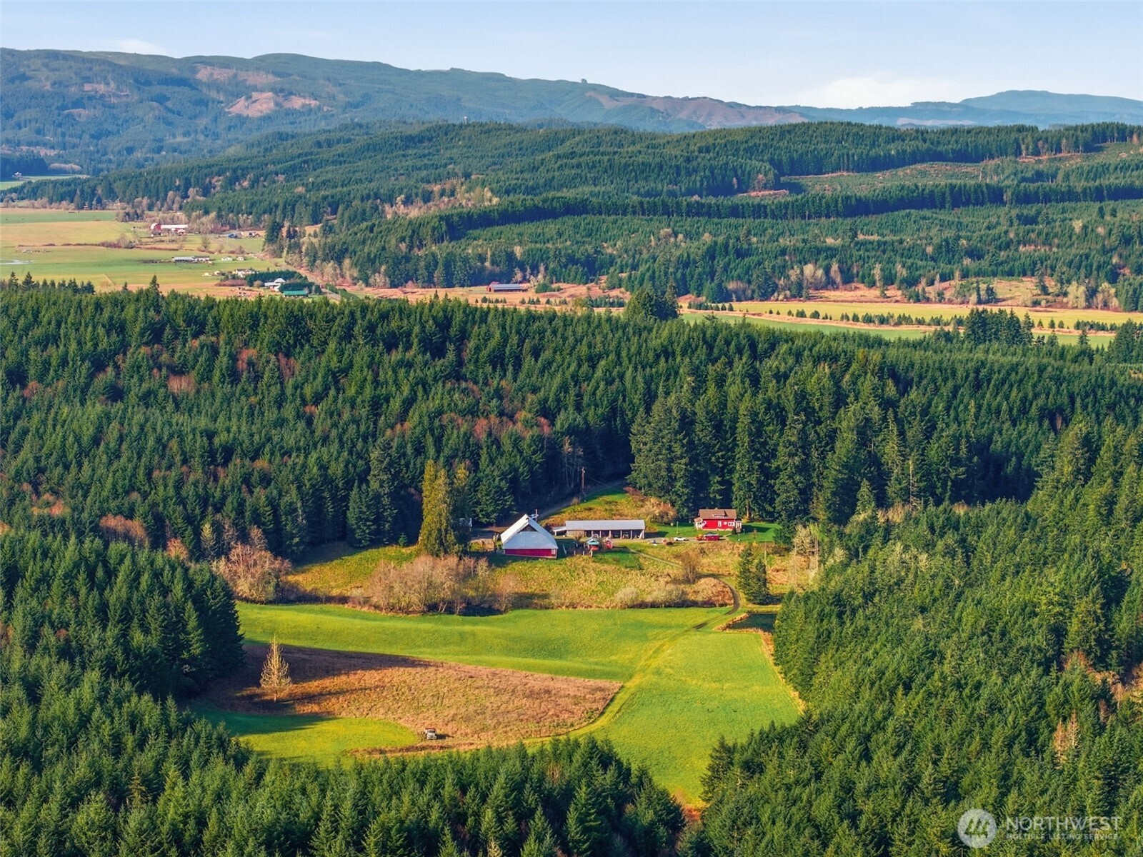 211 Echo Road Rochester, WA 98579 - Photo 6 of 39 a view of a lake with a yard