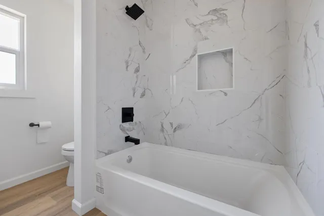 a bathroom with a bathtub