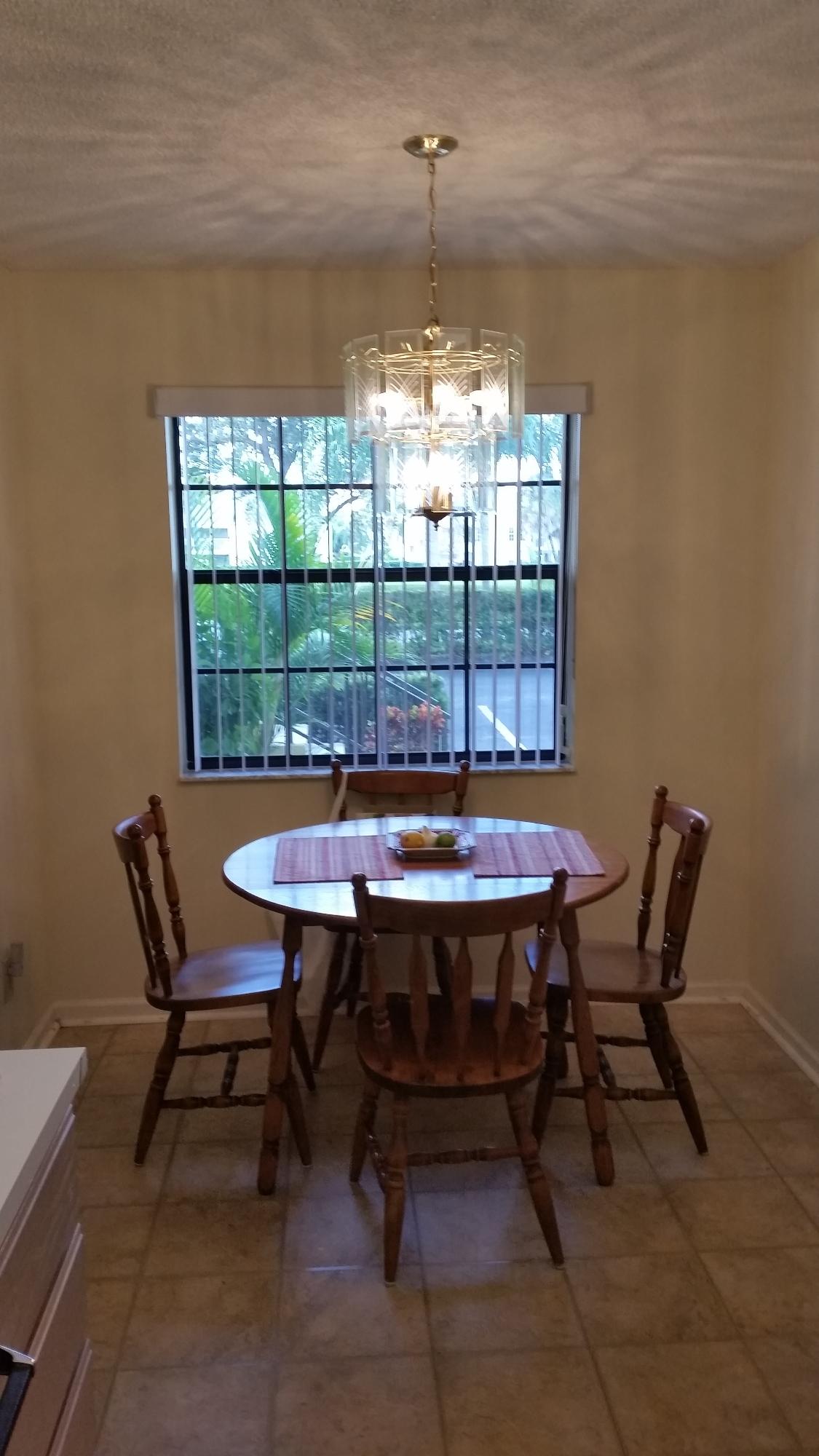 1001 Keystone Drive, Unit H Jupiter, FL 33458 - Photo 4 of 7 1001 Keystone Dr H Dining Rm