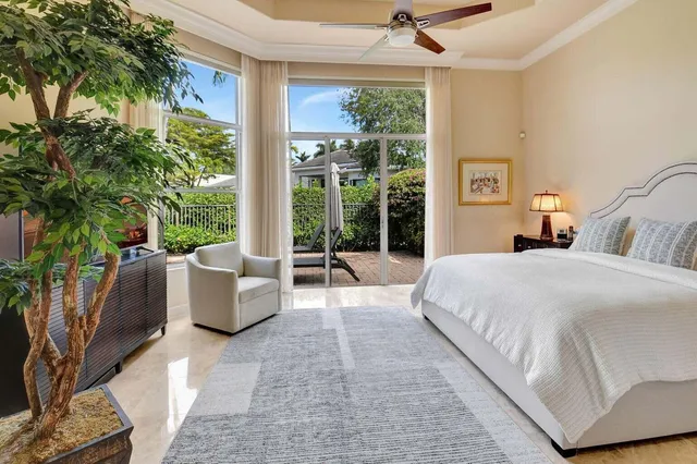 a bathroom with a sink a toilet a mirror and shower