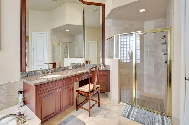 a view of a garden with furniture