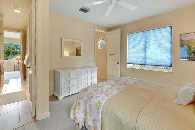 a view of a livingroom with furniture and a window