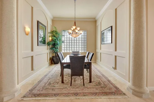 a living room with couches a coffee table and a fireplace
