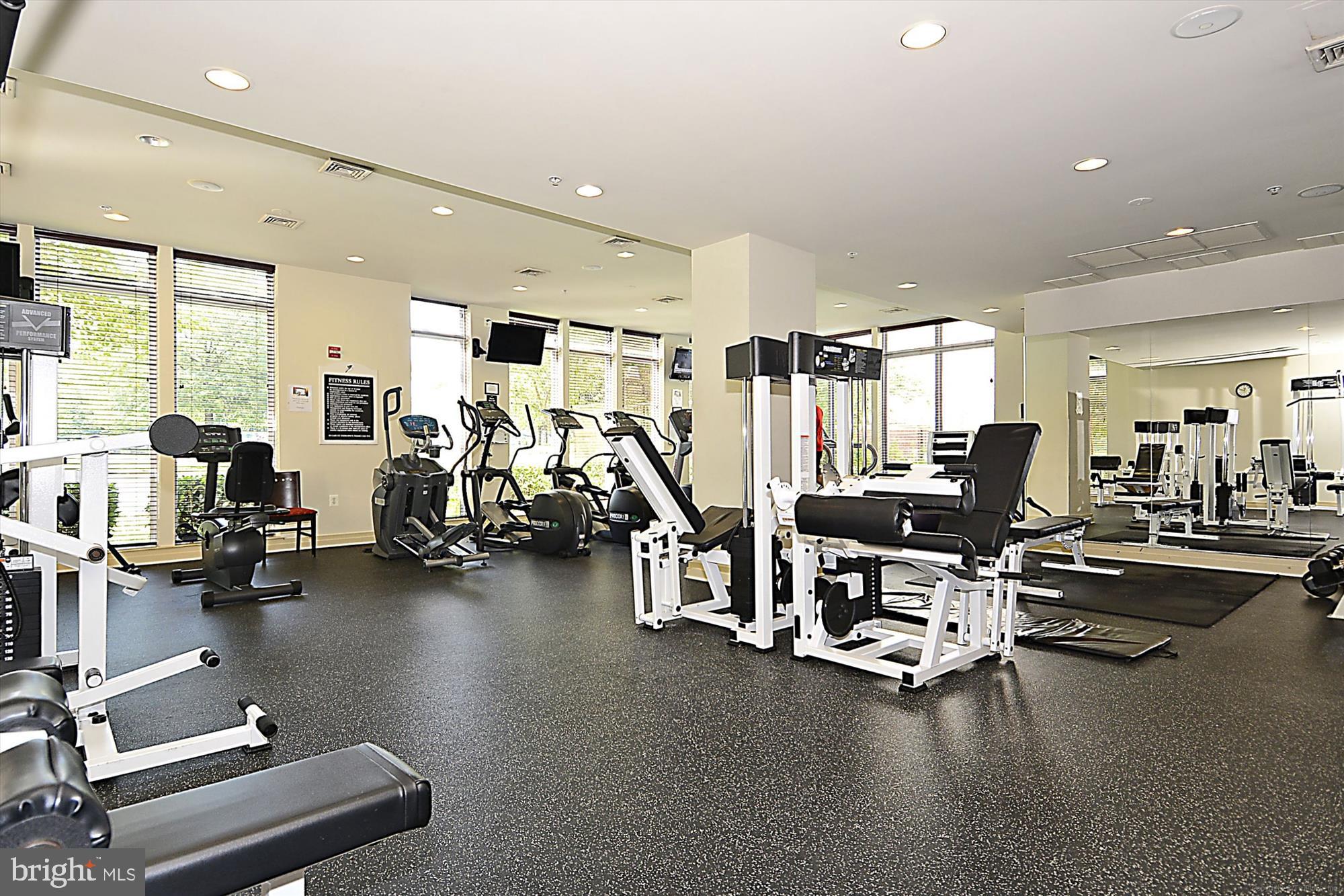 9490 Virginia Center Boulevard, Unit 130 Vienna, VA 22181 - Photo 42 of 57 a view of a room with gym equipment