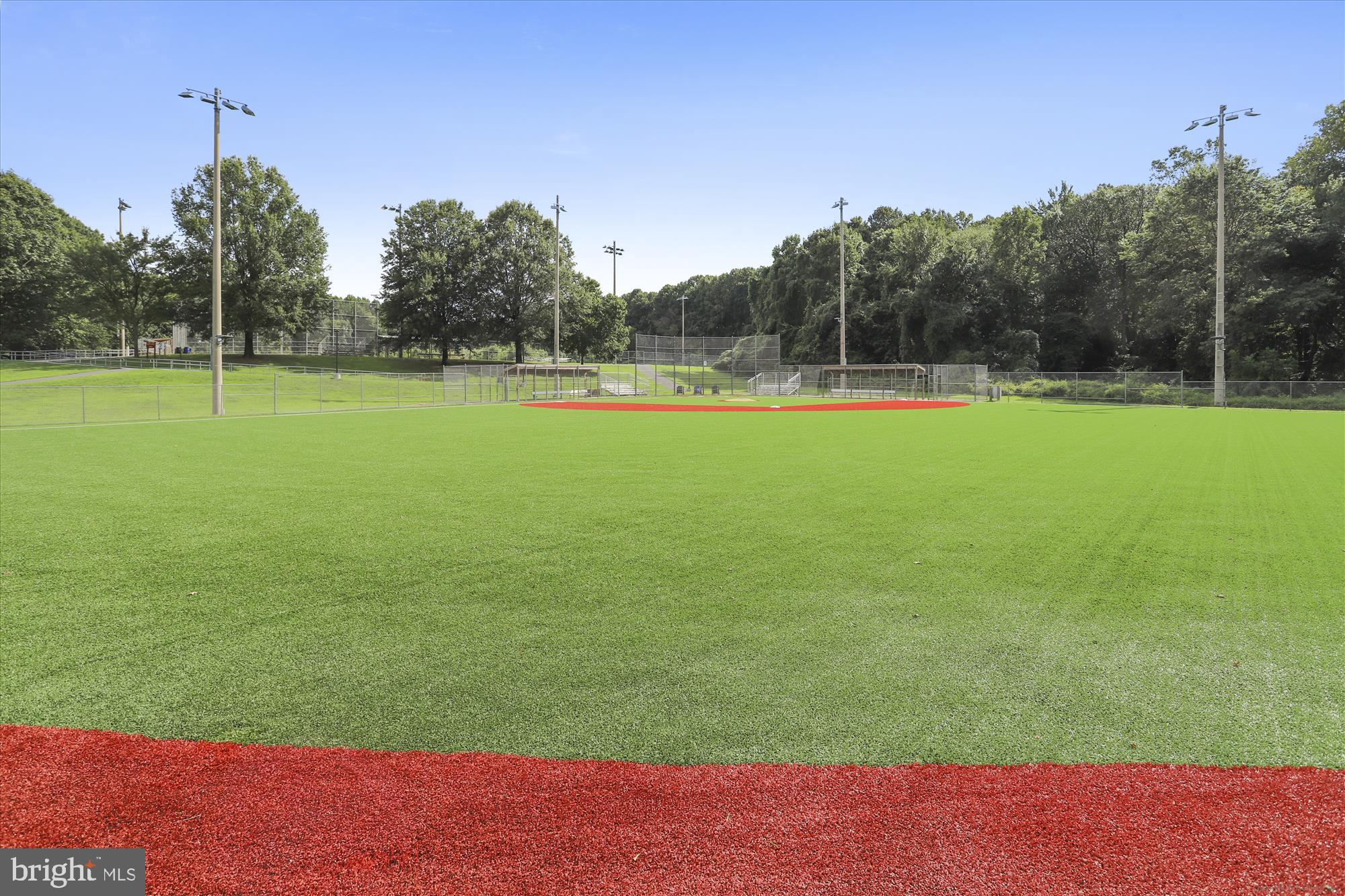 9490 Virginia Center Boulevard, Unit 130 Vienna, VA 22181 - Photo 50 of 57 a view of a field and trees in the background
