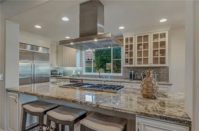 a kitchen with sink and window