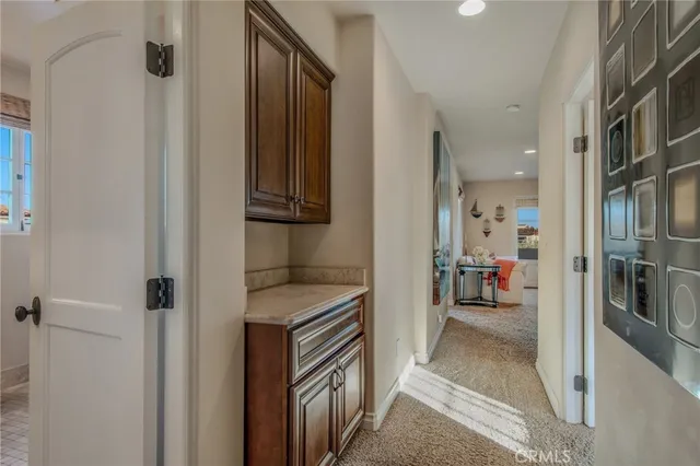 a bedroom with a bed and night stand