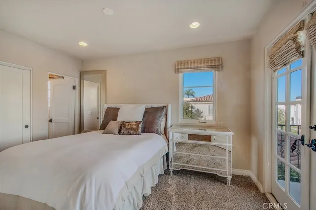 an aerial view of a residential houses with outdoor space