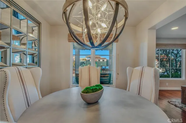 a room with furniture and a potted plant