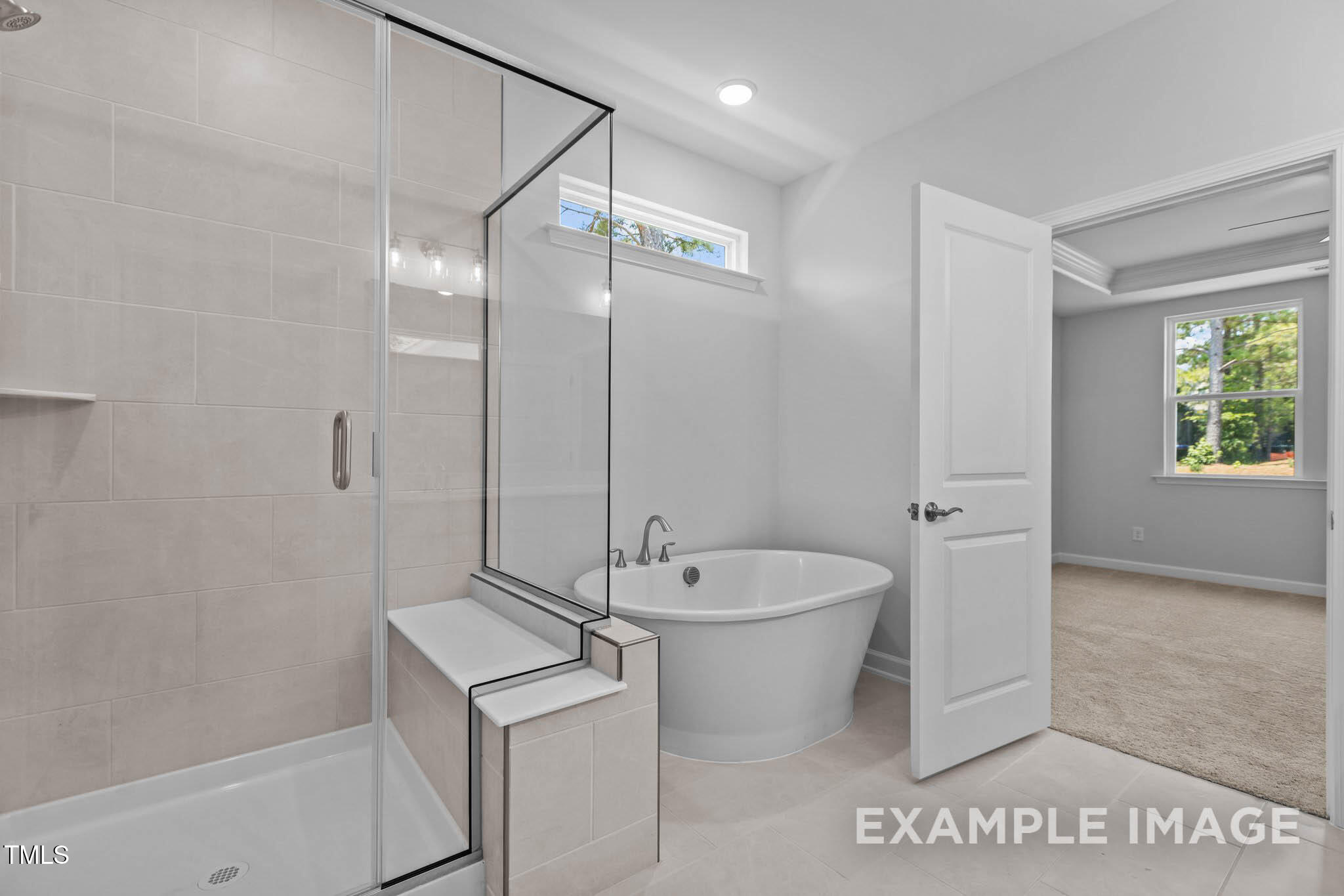 271 Crop Road Angier, NC 27501 - Photo 18 of 28 a bathroom with a toilet a sink and a bathtub