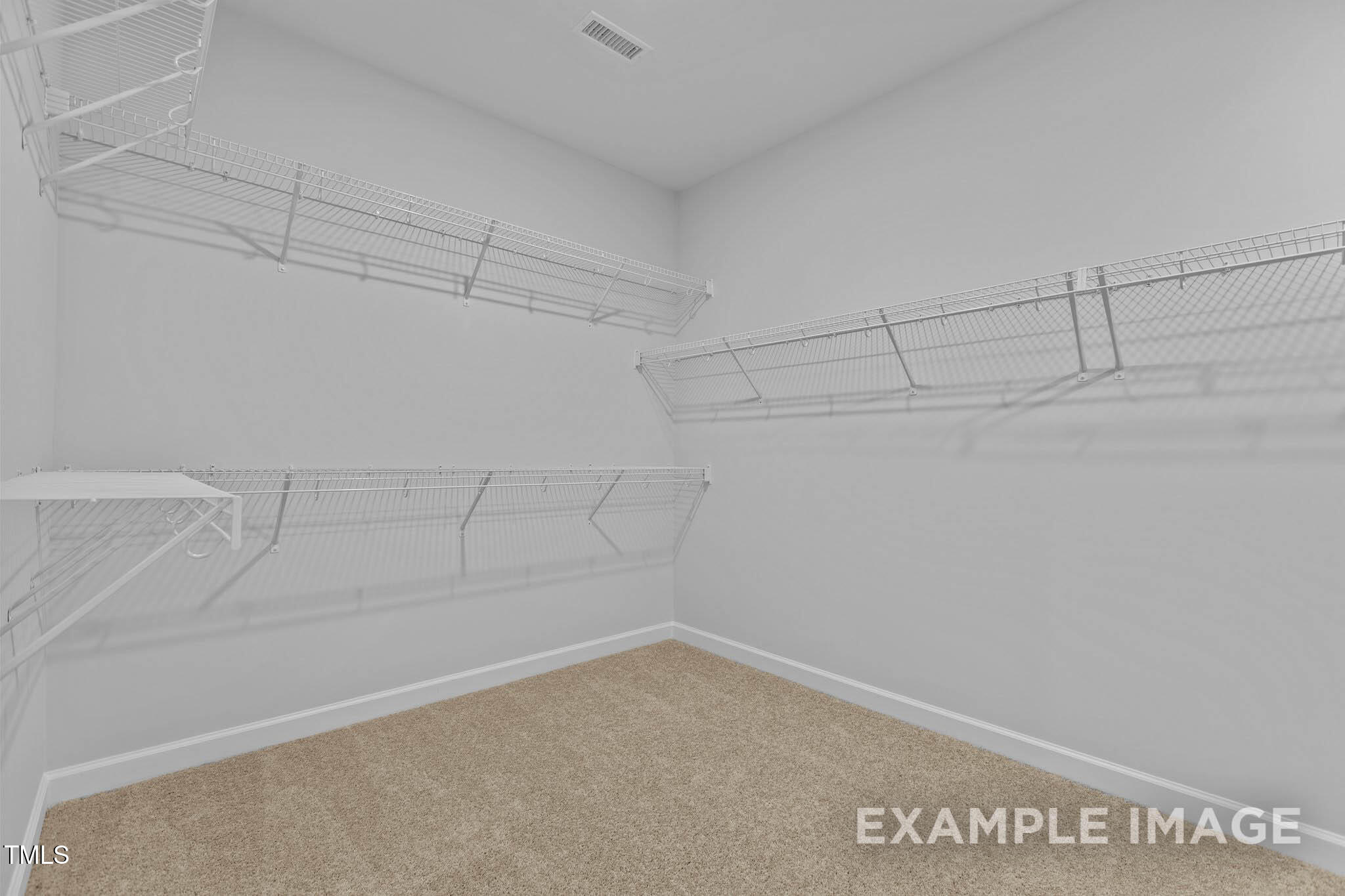 271 Crop Road Angier, NC 27501 - Photo 20 of 28 a view of a room with racks on the wall