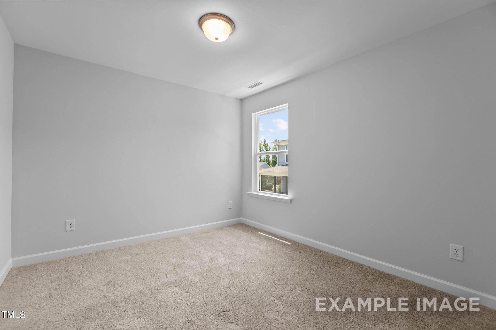 271 Crop Road Angier, NC 27501 - Photo 26 of 28 an empty room with a window
