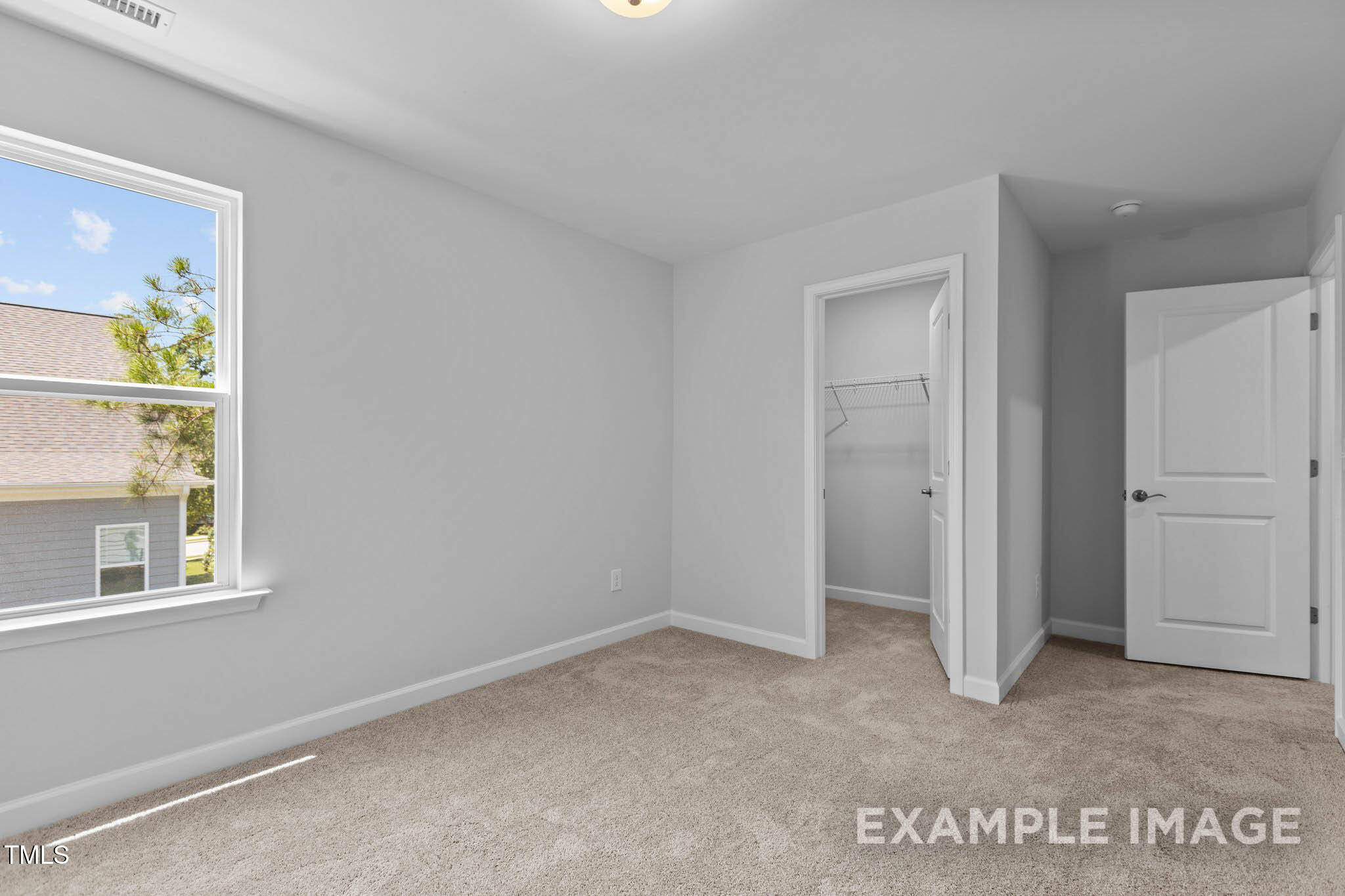 271 Crop Road Angier, NC 27501 - Photo 27 of 28 a view of an empty room with a window