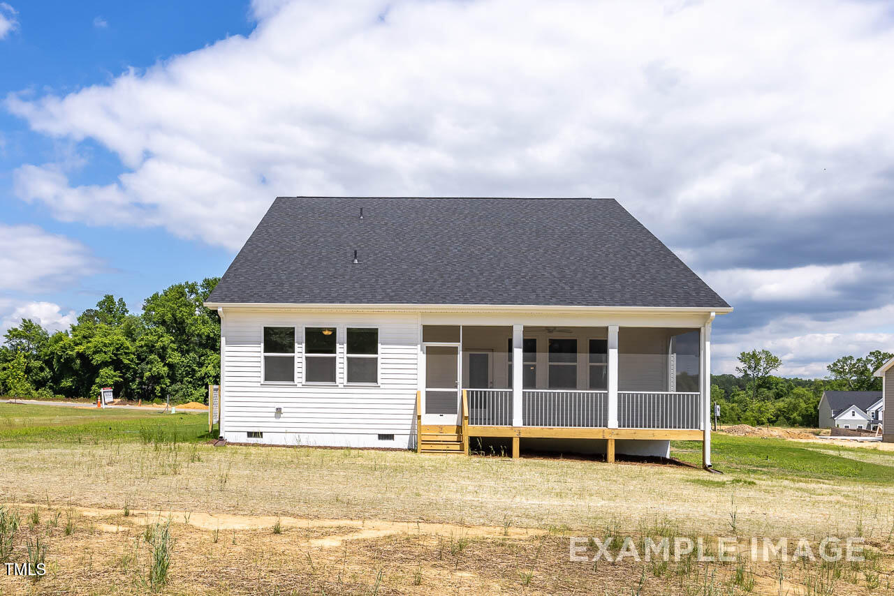 271 Crop Road Angier, NC 27501 - Photo 28 of 28 a view of a house with a swimming pool and a yard