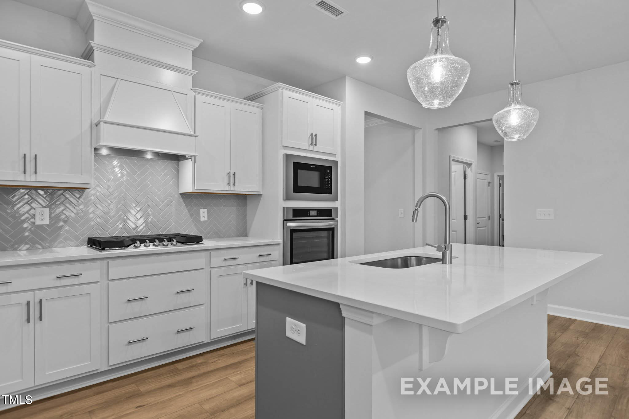 271 Crop Road Angier, NC 27501 - Photo 6 of 28 a kitchen with kitchen island granite countertop a sink stainless steel appliances and cabinets