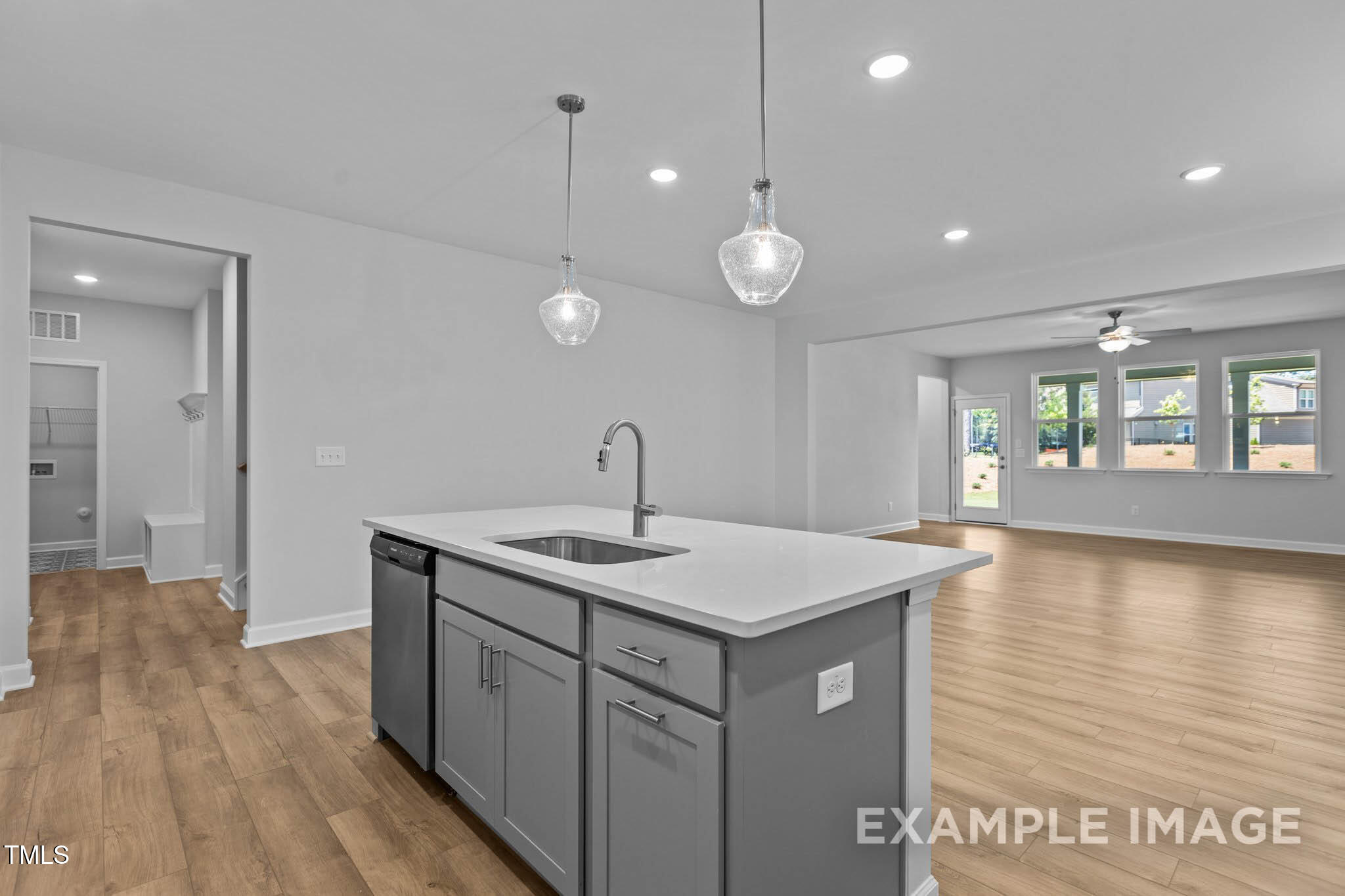 271 Crop Road Angier, NC 27501 - Photo 8 of 28 a kitchen with a sink and stove