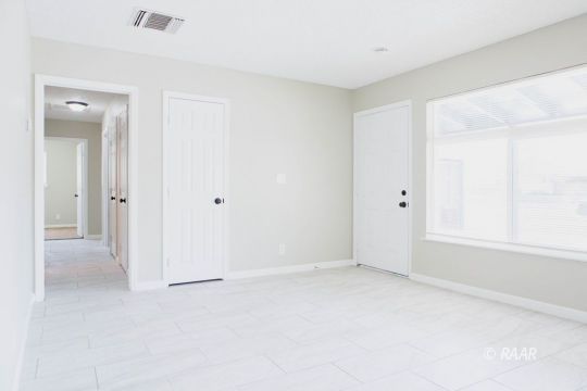 204 North Florence Street Ridgecrest, CA 93555 - Photo 6 of 27 an empty room with windows and closet
