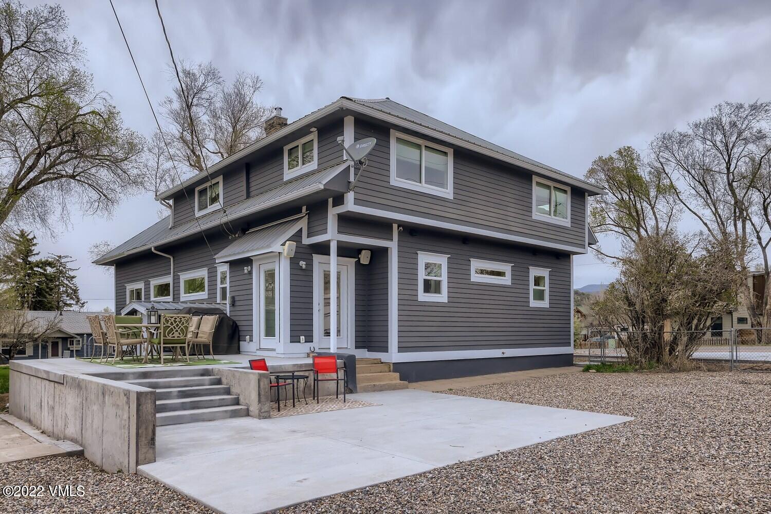 306 Howard Street Eagle, CO 81631 - Photo 28 of 30 a front view of a house with garage